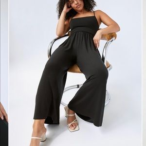 Aritzia black jumpsuit size M